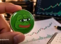 PEPE Hits $0.000005 as Meme Coin Surge Drives 50% Weekly Gain